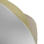 Details of Anti Mirror by Nolita Harbour, bespoke designer mirror in plaster and brass, organic irregular silhouette with tactile finish and precision metal detailing, modern wall mirror blending sculpture and reflection.