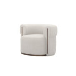 Camille Armchair with rounded back, luxurious fabric upholstery, and walnut accents - 45-degree view