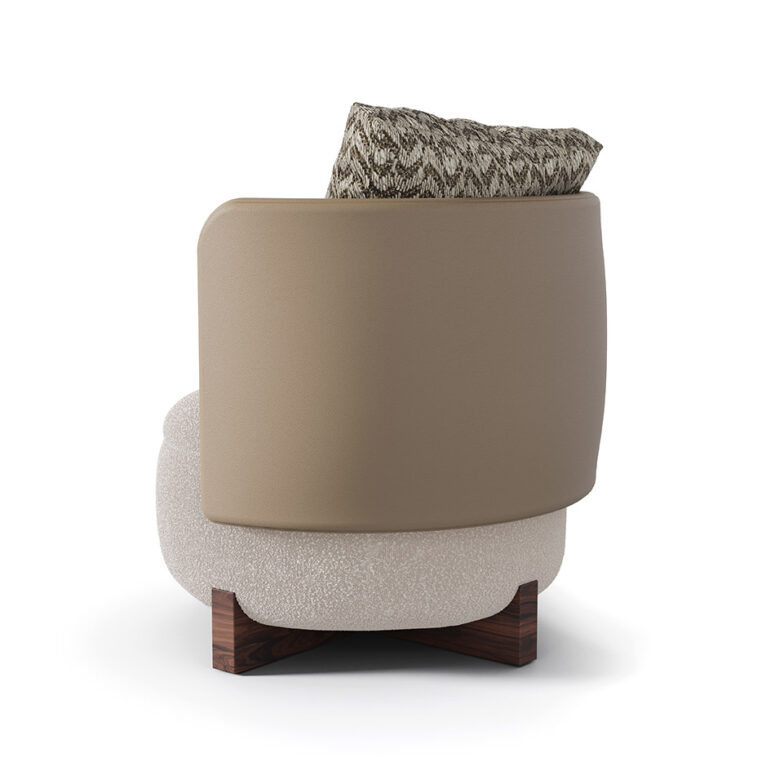 Margot armchair featuring a walnut cross base, upholstered in luxurious bouclé fabric with a leather backrest. The cushion showcases a stylish pattern, blending modern aesthetics with exceptional comfort.