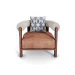 Nolita Harbour Olivia Armchair with a plush seat, rattan back, and matte walnut frame with waved legs.