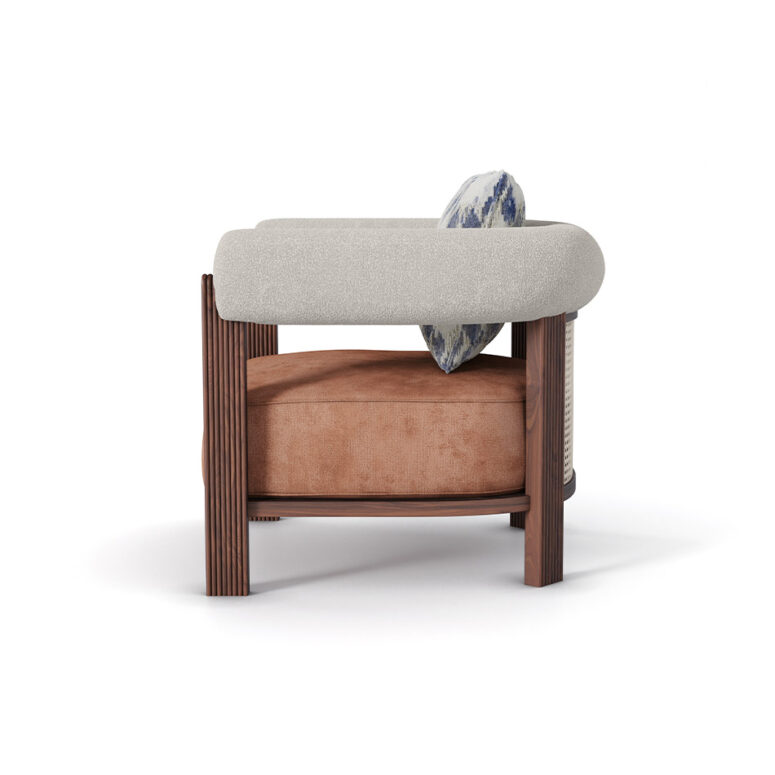 Nolita Harbour Olivia Armchair with a plush seat, rattan back, and matte walnut frame with waved legs.