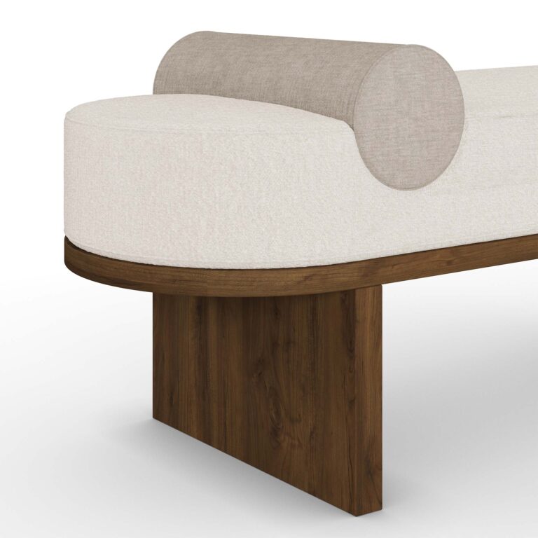 Close-up of Grace Bench's cylindrical bolsters and plush upholstery