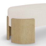 Close-up of Gilda Bench's plush upholstered seat and solid oak base