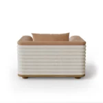 Celine bouclé armchair by Nolita Harbour, sculptural lounge chair with velvet seat, fluted shell, and elegant timber base.