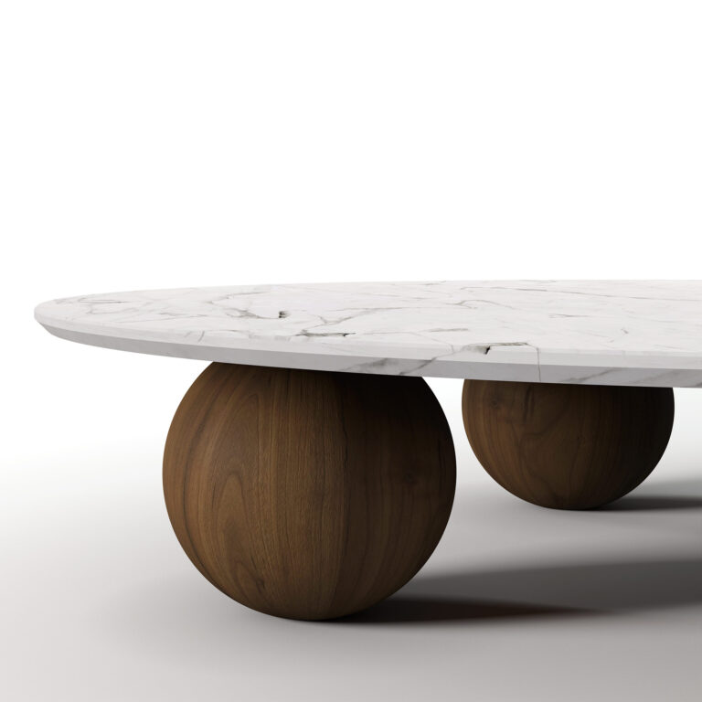 Nolita Harbour Jhoan Coffee Table with a sleek round marble top and unique wooden spherical legs.