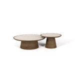 A modular round Liz Coffee Table featuring a matte walnut base and a travertine top. The table combines natural elegance with modern design.