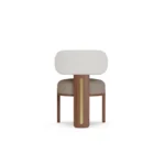 Diane upholstered dining chair by Nolita Harbour, textured bouclé chair with sculptural walnut base and calm silhouette.