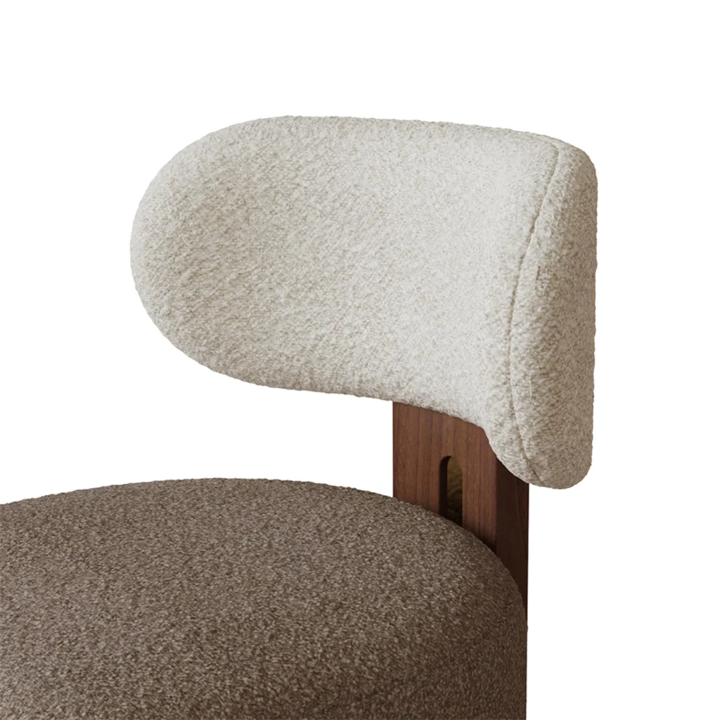 Diane contemporary dining chair details by Nolita Harbour, bouclé upholstered chair with rounded form and clean walnut structure.