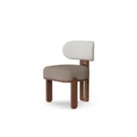 Diane dining chair by Nolita Harbour, bouclé upholstered chair with walnut base and crescent back, sculptural modern design.