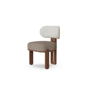 Diane dining chair by Nolita Harbour, bouclé upholstered chair with walnut base and crescent back, sculptural modern design.