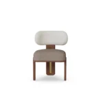 Diane luxury dining chair by Nolita Harbour, bouclé chair with curved silhouette and architectural walnut base.