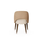 Nolita Harbour Paris Dining Chair with plush seat and backrest upholstered in premium fabric.