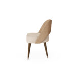 Nolita Harbour Paris Dining Chair with plush seat and backrest upholstered in premium fabric.