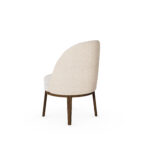 Nolita Harbour Caroline Dining Chair with a plush, round seat and distinctive shell-like backrest in premium boucle fabric.