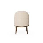 Nolita Harbour Caroline Dining Chair with a plush, round seat and distinctive shell-like backrest in premium boucle fabric.