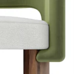 Édith velvet dining chair details by Nolita Harbour, luxury upholstered chair with curved shell, slim arms, and refined walnut base.