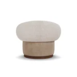 Elise contemporary armchair by Nolita Harbour, bouclé upholstered chair with sculptural scroll back and refined walnut detailing.