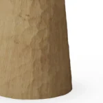 Base view of the Elke Side Table, a sculptural side table by Nolita Harbour in travertine and oak, combining a veined stone top with a carved oak base.
