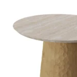 Elke Side Table, an elegant side table by Nolita Harbour crafted in travertine and oak, with a textured carved base and natural stone surface