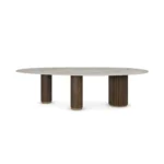 Élodie Dining Table, an architectural dining table by Nolita Harbour in marble and walnut, with precise detailing.