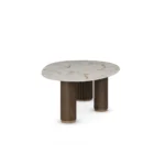 Élodie Dining Table, a contemporary dining table by Nolita Harbour in marble and wood, with a composed form.
