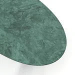 Emerald Dining Table, a modern dining table by Nolita Harbour in green marble, walnut, and rattan, with an oval form and warm base