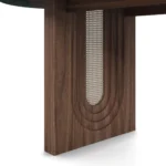 Emerald Dining Table, a sophisticated dining table by Nolita Harbour in green marble, walnut, and rattan, featuring balanced proportions
