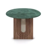 Emerald Dining Table, a sculptural dining table by Nolita Harbour in green marble, walnut, and rattan, combining rich tones and textures