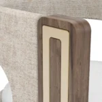 Goldie velvet dining chair details by Nolita Harbour, luxury upholstered chair with walnut base and refined cut-out back.