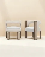 Goldie dining chair by Nolita Harbour, velvet upholstered chair with walnut frame and brass feet, sculptural cut-out back and modern silhouette.
