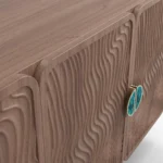 Henry Sideboard, a refined sideboard by Nolita Harbour crafted in walnut and ceramic, with textured doors and subtle undulating lines