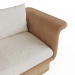 Isabella velvet armchair detail by Nolita Harbour, luxury lounge chair with bouclé interior and rounded architectural silhouette.