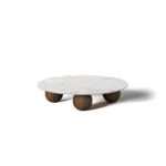 Jhoan Coffee Table by Nolita Harbour, a round coffee table in Estremoz marble with a sculptural wood base.