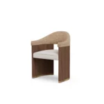 Junna walnut dining chair by Nolita Harbour, bouclé upholstered seat with curved open back and elegant architectural line.