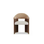 Junna bouclé dining chair by Nolita Harbour, luxury upholstered chair with tapered walnut legs and sculptural back.