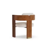 Lana luxury dining chair by Nolita Harbour, curved upholstered chair with refined proportions and light timber legs.