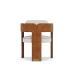 Lana designer dining chair by Nolita Harbour, upholstered chair with soft architectural lines and sculptural timber legs.