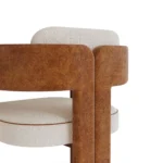 Lana dining chair details by Nolita Harbour, upholstered dining chair with curved back and timber legs, refined architectural silhouette.