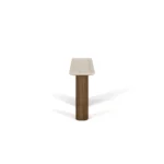 Livia Console, a refined console table by Nolita Harbour in travertine and wood, featuring ribbed legs and a clean silhouette.