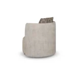 Lucie contemporary armchair by Nolita Harbour, refined fabric armchair with sloped arms and sculptural timber base.