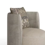 Lucie upholstered armchair detail by Nolita Harbour, luxury accent chair with sloped arms and refined wood base.
