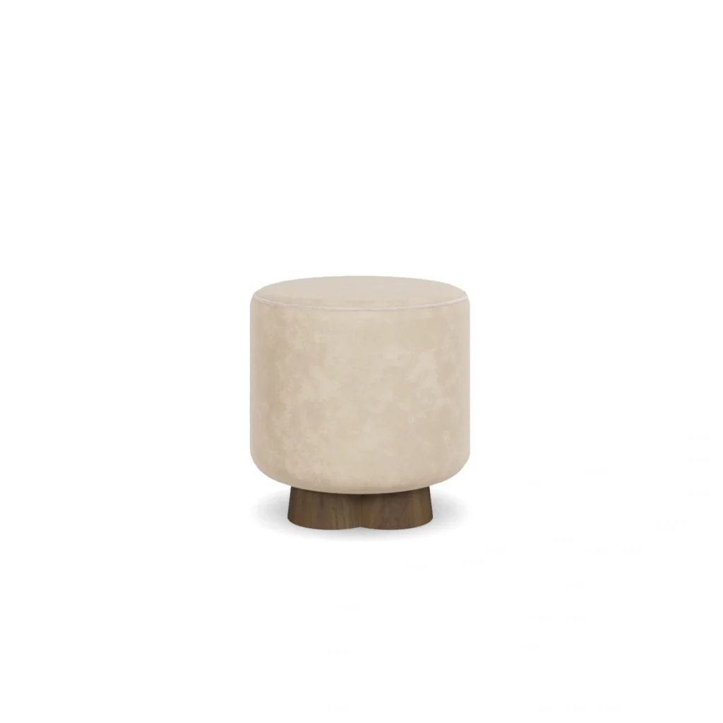 Mae accent stool by Nolita Harbour, upholstered velvet ottoman with circular padded seat and smooth, sculptural profile.