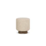 Mae accent stool by Nolita Harbour, upholstered velvet ottoman with circular padded seat and smooth, sculptural profile.