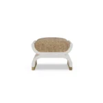 Malou bouclé ottoman by Nolita Harbour, upholstered stool in textured bouclé with sculptural curved seat and refined elevated base.