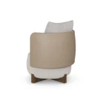 Margot armchair by Nolita Harbour, sculptural leather accent chair with bouclé upholstery and architectural wood frame.