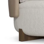 Margot leather armchair detail by Nolita Harbour, luxury lounge chair with bouclé seat and refined solid wood base.