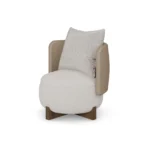 Margot armchair by Nolita Harbour, leather and bouclé upholstered armchair with wood cross-base and sculptural silhouette.