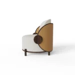 Marie designer armchair by Nolita Harbour, bouclé accent chair with cradle-like seat and elegant walnut craftsmanship.