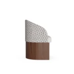 Melli luxury dining chair by Nolita Harbour, bouclé chair with wraparound silhouette, brass spine, and elegant walnut frame.