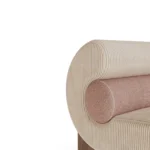 Mia designer armchair detail by Nolita Harbour, bouclé lounge chair with continuous curved shell and refined wood base.